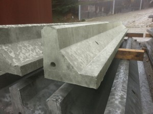 Stacked precast concrete heelstone coping sections in the WCCP yard, Devon