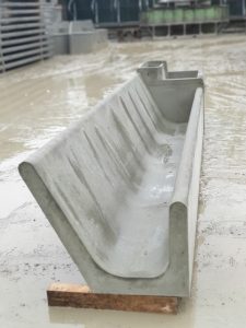 Young-stock J-shape single-sided precast concrete feed trough section by WCCP Devon