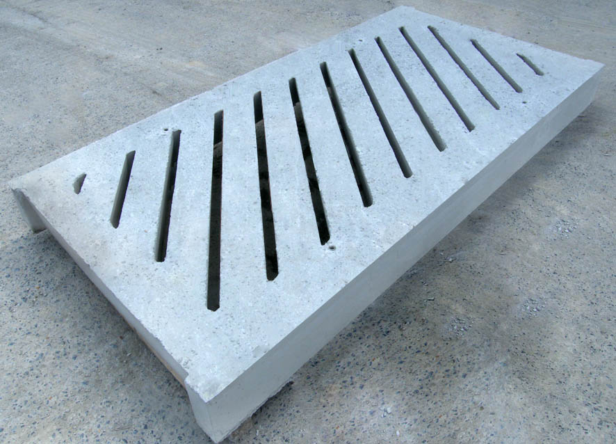 Precast concrete slatted slurry-channel cover with parallel slots by WCCP Devon
