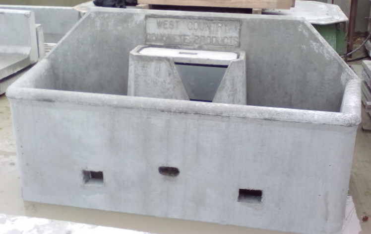 Single-row cubicle end-wall precast concrete water trough with central drinking bowl by WCCP Devon